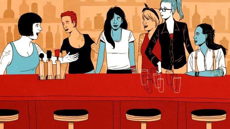 Women talking behind the bar