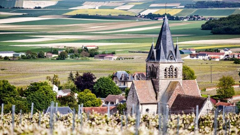 Aerial view of a church and vineyards in Champagne France