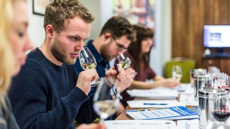 Students at a wine education course